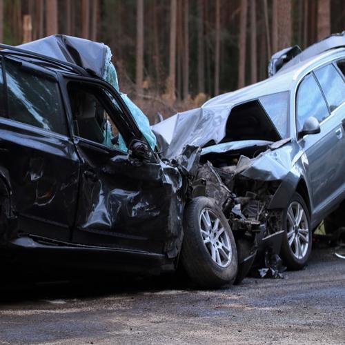 Two car badly damaged in head-on collision concept of North Augusta car accident lawyer