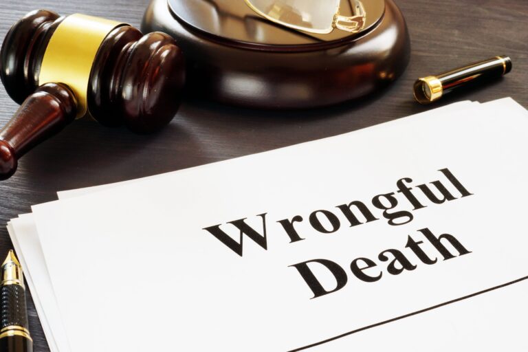 A judge's gavel and paper that says wrongful death.